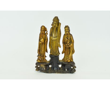 Chinese Early Finely Carved 19th Century Soapstone Group Figure of Three Bearded Immortals, One Holding a Peach another Holdi