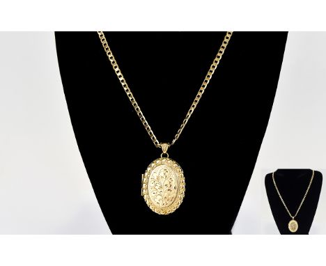 A Very Nice Quality 9ct Gold Oval Shaped Hinged Locket with Attached Long 9ct Gold Curb Chain. The Locket with Engraved Flora