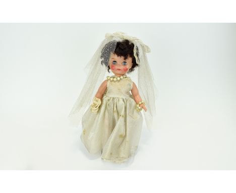 Pedegree Dolls Boxed Bride Doll, L12/A45, in original lurex wedding dress, mesh veil and corsage, with curly brown hair, slee