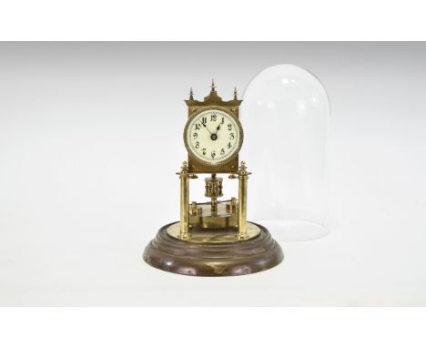 A Vintage Brass 400 Day Anniversary Clock Small brass clock with cream ceramic dial and black numerals, housed in domed glass