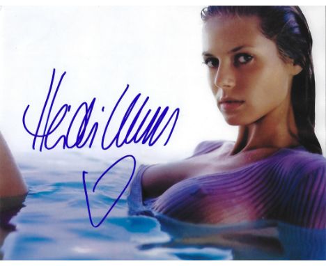 Heidi Klum signed 10x8 colour photograph. Klum is a German American model, television host, producer, and businesswoman. She 