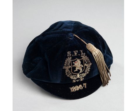 An unusual award of a cap by the Scottish Football League to Thomas Pollock Low of Glasgow Rangers for the representative mat