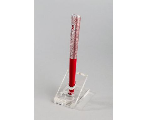A scale model of the Beijing 2008 Olympic Games torch,measuring 29cm. (the bearer's torches 72cm,) made from steel left over 