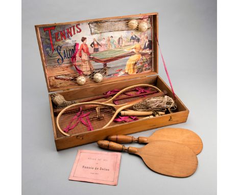A rare wooden boxed set of "Tennis de Salon" circa 1900,containing two strung rackets, two rare Tennis de Salon bats with tur