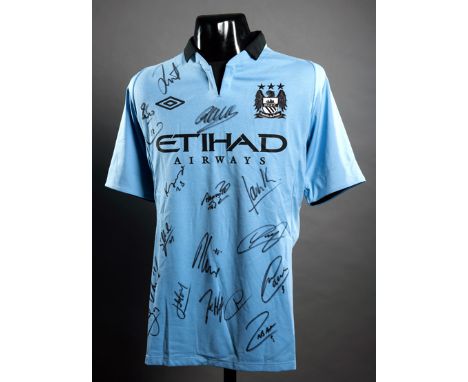 Replica Manchester City jersey signed by the 2011-12 Premier League Champions,16 signatures in black marker pen comprising Le