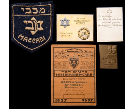 A collection of Jewish sports medals and memorabilia,comprising:i) a 1932 Z.S.K. (Zidovsky Sportovni Klub) Hagibor Prague, Cz