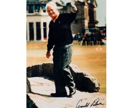 Two signed framed photographs of the golfer Arnold Palmer,from the private collection of the golf artist Bill Waugh, the firs