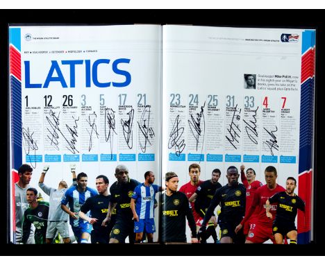 Limited edition deluxe version of the 2013 F.A. Cup Final programme Manchester City v Wigan Athletic signed by both teams,sig