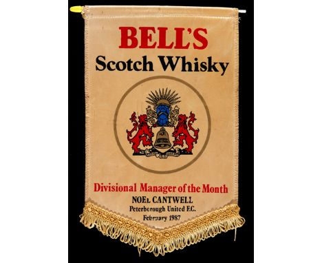 Noel Cantwell Manager of the Month pennant,inscribed BELL'S SCOTCH WHISKY, DIVISIONAL MANAGER OF THE MONTH, NOEL CANTWELL, PE