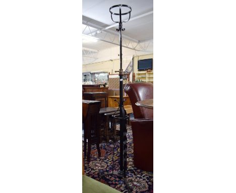 A Brass Mounted Wrought Iron Adjustable Rise and Fall Oil Lamp Stand on Tripod Support 