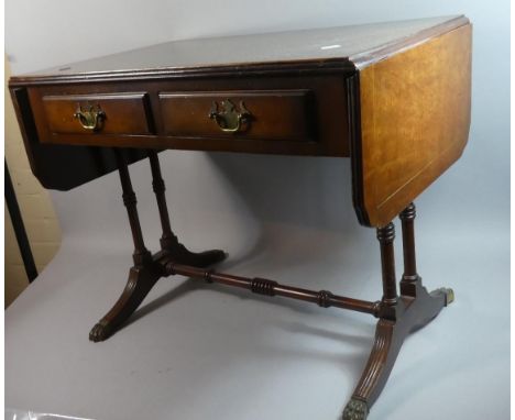 A Reproduction Mahogany Drop Leaf Sofa Table with Two Drawers, Turned Supports and Stretchers, 64.5cm Wide 