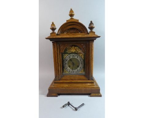 An Edwardian Oak Bracket Clock by Junghans with Silvered Chapter Ring and Gilt Spandrels, Acorn Finials and Quarter Reeded Pi