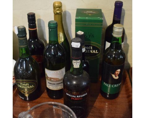 A Tray Containing Four Bottles of Sherry, One Bottle of Port, Two Bottles of Red Wine and Bottle of Sparkling Wine 