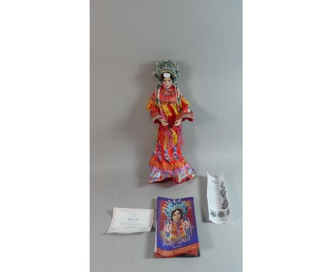 A Chinese Bride Doll, Mei Lan with Porcelain Head. By Danbury Mint and with Promotional Material, 49cm high 