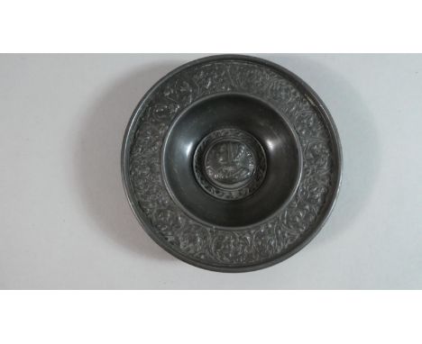 A Pressed Pewter Dish with Inner Portrait, "Elysabet" and Floral Decorated Rim in Relief, 11.25cm Diameter 