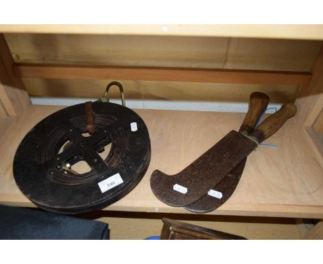 TWO VINTAGE BILL HOOKS AND A VINTAGE METAL TAPE MEASURE