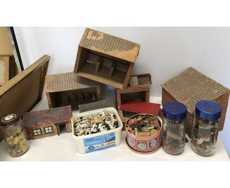 Vintage farm buildings and plastic and wooden animals etc. 