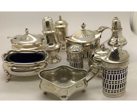 Various silver cruets some with blue glass liners, 2a/f. Silver weight 361.4gms. (11)