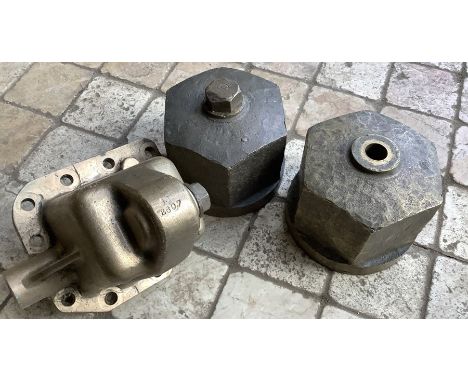 A pair of large brass propellor nuts, 14.5cms w, 12cms h, one with bolt stamped 10 with another brass item stamped 2607.