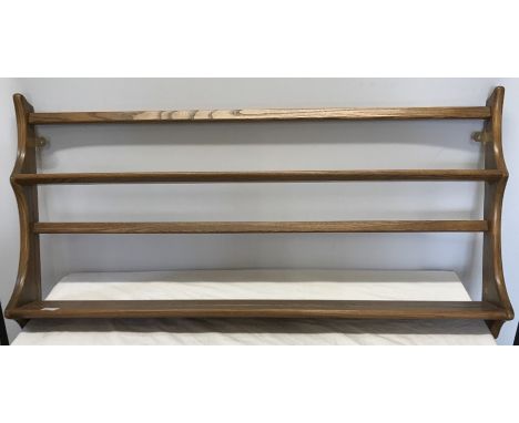 Ercol golden dawn wall mounted plate shelf. 96xms w x 50cms h.