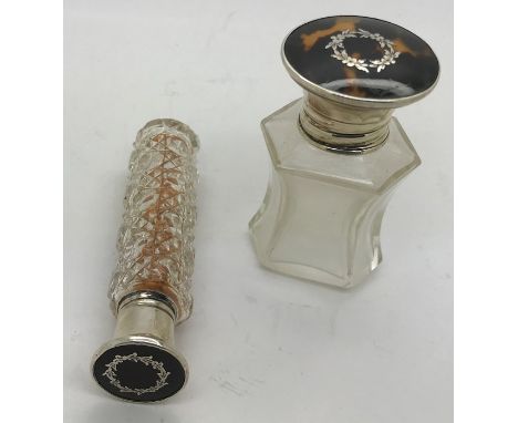 Two silver piqué and tortoiseshell scent/smelling salts bottles, Birmingham 1922 and Birm 1924. Both good condition apart fro