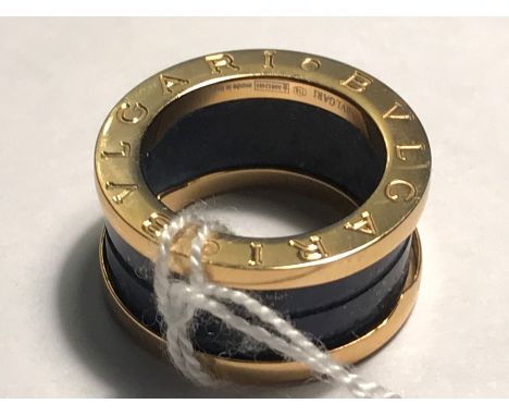 Ladies dress ring marked Bvlgari. Size L. marked to inside Bvlgari 750 made in Italy AN852405. Very good condition, very ligh