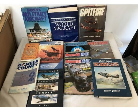 A quantity of aircraft books including the Encyclopedia of World Aircraft, Spitfire, Britains Aviation Heritage. 