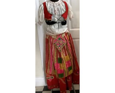 A vintage costume to include skirt, apron, blouse, waistcoat, hand embroidered, fits mannequin, size 10/12.