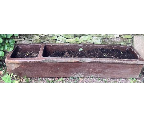 A vintage brown glazed trough. 182 l x 44 d x 35cms h. 