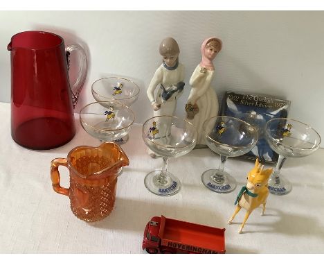 A boxed lot to include a 19thC cranberry glass jug 19cms h, 5 Babycham glass, a plastic Babycham deer, a carnival glass jug, 