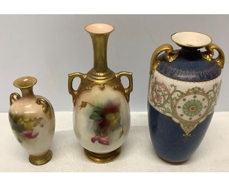 Two rose painted Royal Worcester vases, a hairline to the neck of the taller one, 21cms h, possible restoration to the neck o