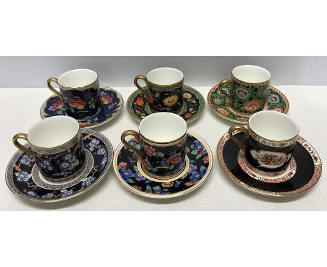 Six Wedgwood coffee cans and saucers with different patterns on each. All good condition. 