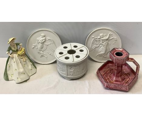 Two Royal Copenhagen bisque circular plaques, 15cms continental lidded candle holder and a Wardle chamberstick, reg no. 70429