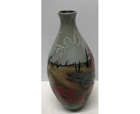 A Moorcroft Lest We Forget vase, 24cms h, printed, painted and impressed marks to base. Initialled K W, good condition. 