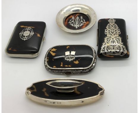 Five pieces tortoiseshell including silver piqué pin tray, three purses and nail buffer, 1 purse slight crack. 
