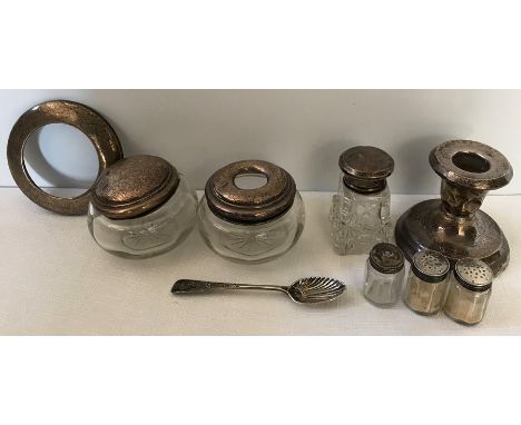 Six various silver and glass items to include picture frame, hair tidy, candlestick, spoon and two silver topped jars, some w