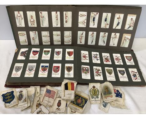 A large quantity of cigarette cards including 2 books with Will's Arms of the British Empire, (50) Will's Arms of Coinage (50