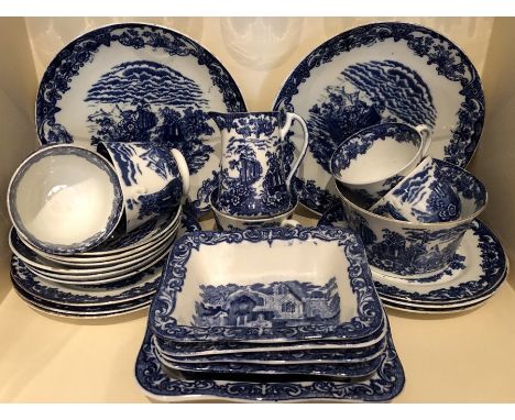 Blue/white tea service with George Jones shredded wheat dishes, 4 small, 1 double plus tureens etc. chip to plate. 