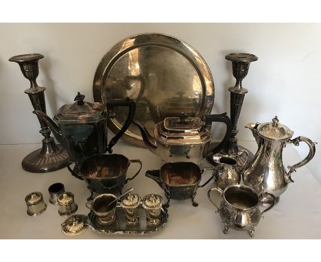 A boxed lot of silver plated items ti include tea service, candlesticks 29cms h, tray, cruet services etc. All good condition