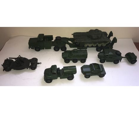 A collection of Dinky tanks to include Scout Car 673, Army Water Tanker 643, Field Artillery Tractor 688, Trailer, Armoured P