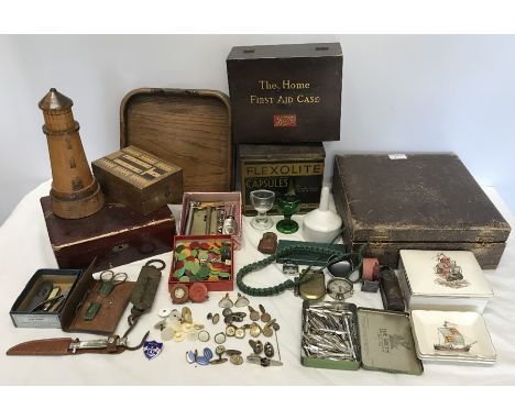 Mixed lot, Gents travel vanity case, Boots first aid case and contents, lighthouse money box, crumb tray, cribbage box, cuffl