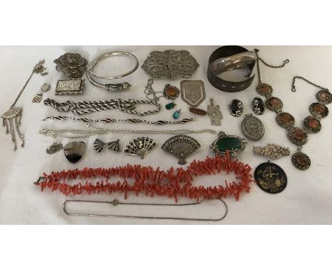 A selection of vintage jewellery to include silver bangles, coral, Victorian silver brooches, EPNS nurses buckle, silver book
