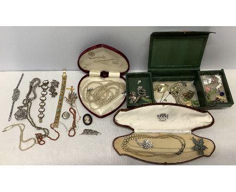 A quantity of vintage costume jewellery to include shell cameo bracelet, silver, marcasite, coral, faux pearls etc, pearls wi