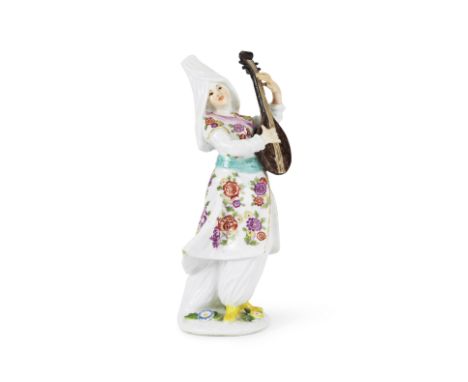 Statuette en porcelaine de Meissen répresentant un musicien turc, circa 1745A Meissen figure of a Turkish musician, circa 174