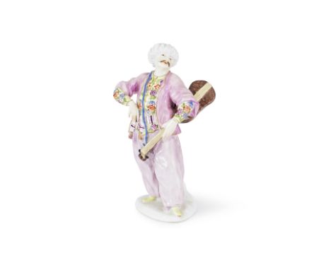 Statuette en porcelaine de Meissen répresentant un musicien turc, circa 1745A Meissen figure of a Turkish musician, circa 174