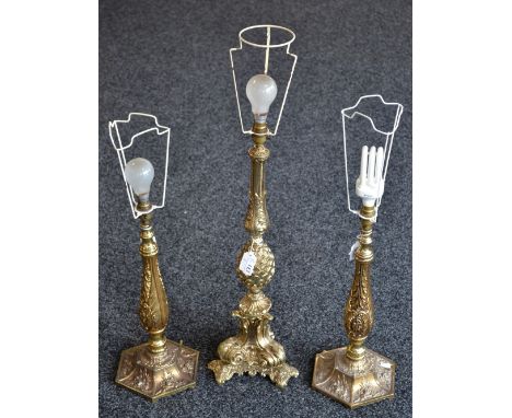 Lighting - a pair of neo Baroque gilt metal table lamps; another, boldly cast with a pineapple balluster (3)