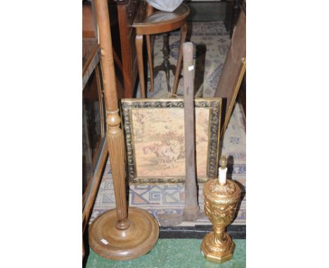 A wooden lamp standard; a Renaissance revival gilt table lamp; a tapestry fire screen, etc (4)