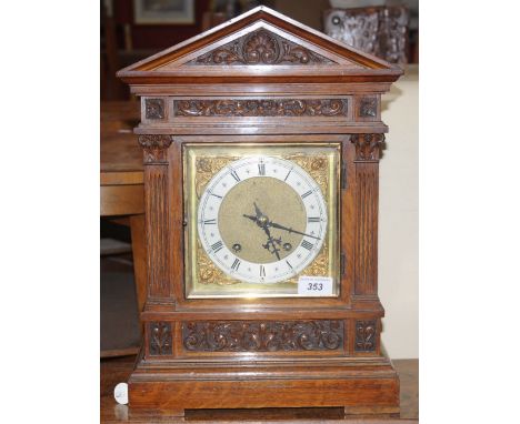 A Winterhalder and Hoffmeier oak bracket clock, architectural pediment, silvered chapter ring, Roman numerals, gilt metal spa