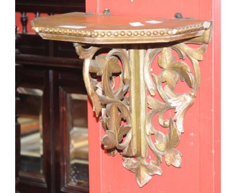 A giltwood wall bracket 