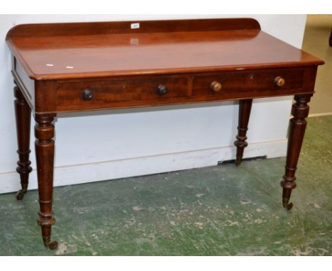 A Victorian mahogany hall table, galleried back, moulded top, two short drawers to frieze, turned handles, turned tapering su